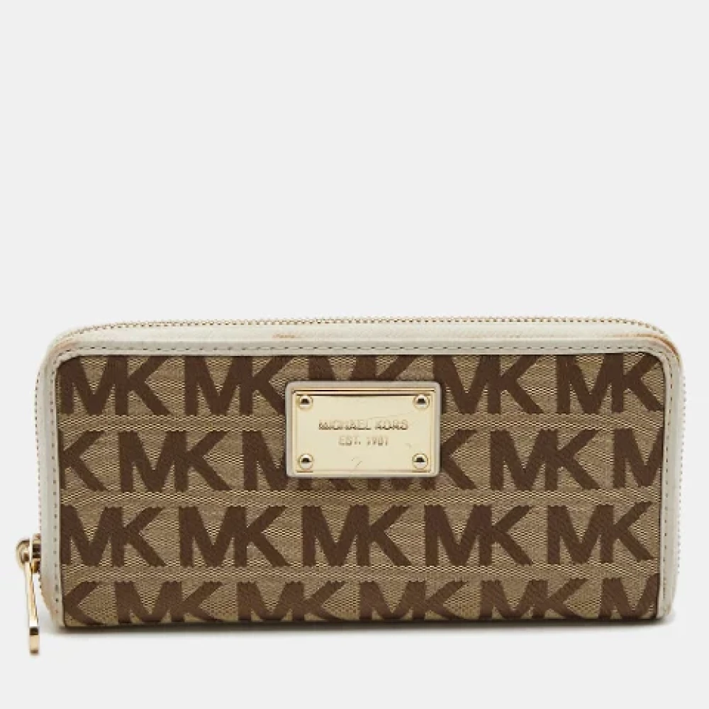 Michael Kors Pre-owned Canvas wallets Beige Dames