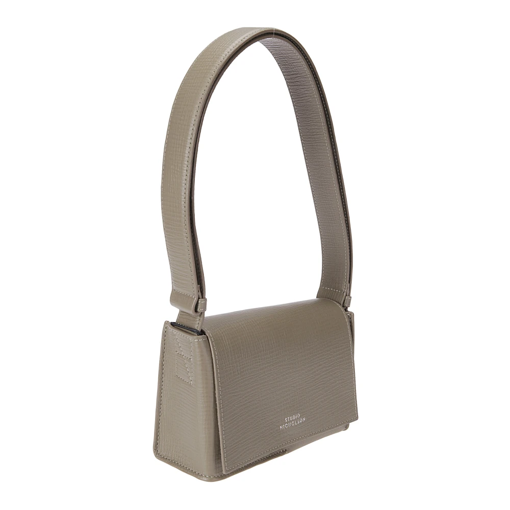 Studio Nicholson Leren schoudertas met bedrukt logo Beige Dames