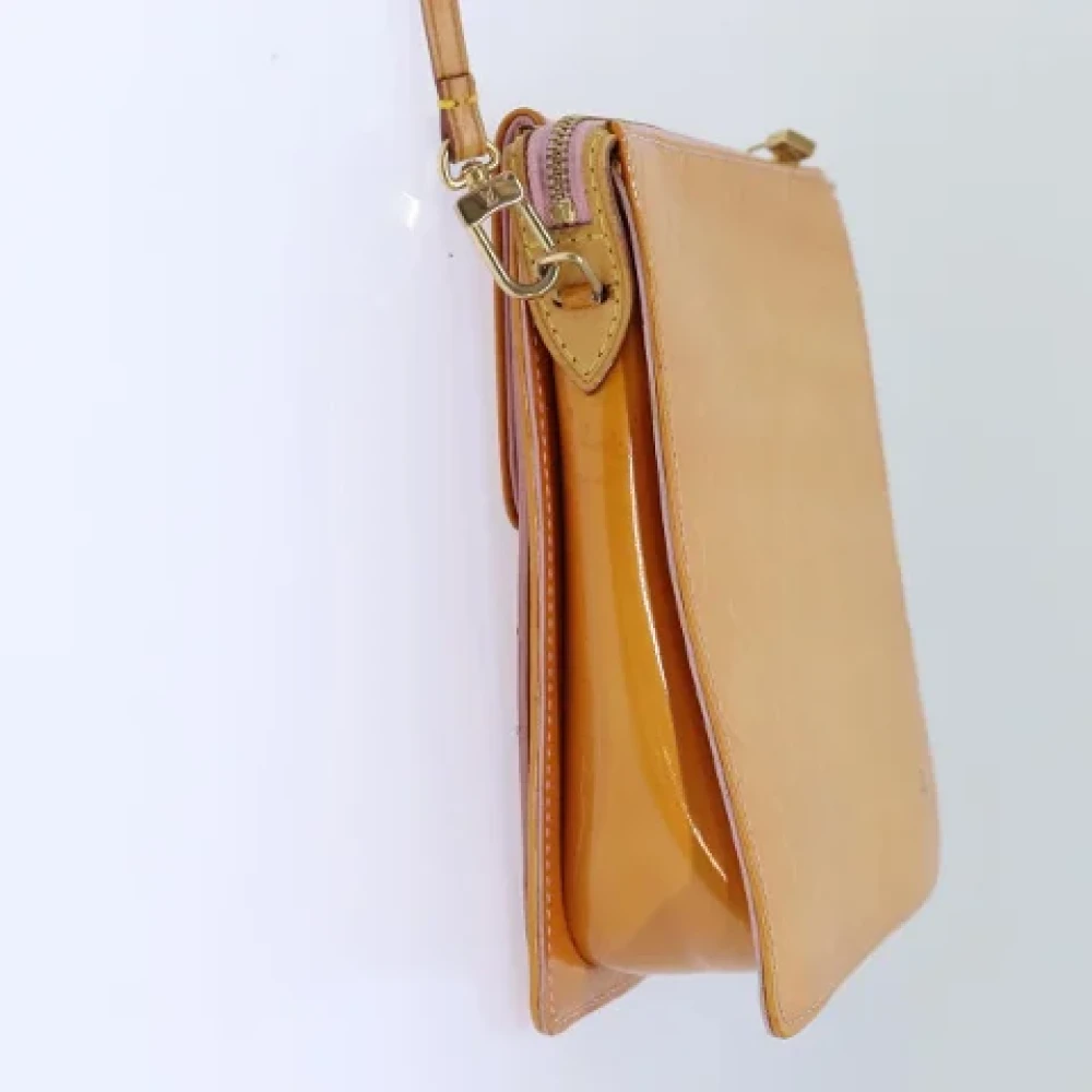 Louis Vuitton Vintage Pre-owned Leather pouches Yellow Dames