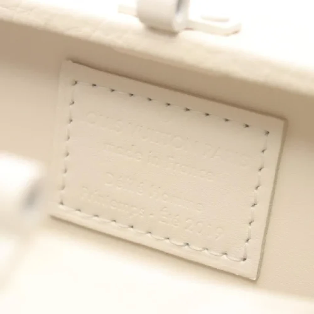 Louis Vuitton Vintage Pre-owned Canvas clutches White Dames