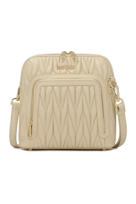 Beige handväska med slående quiltning