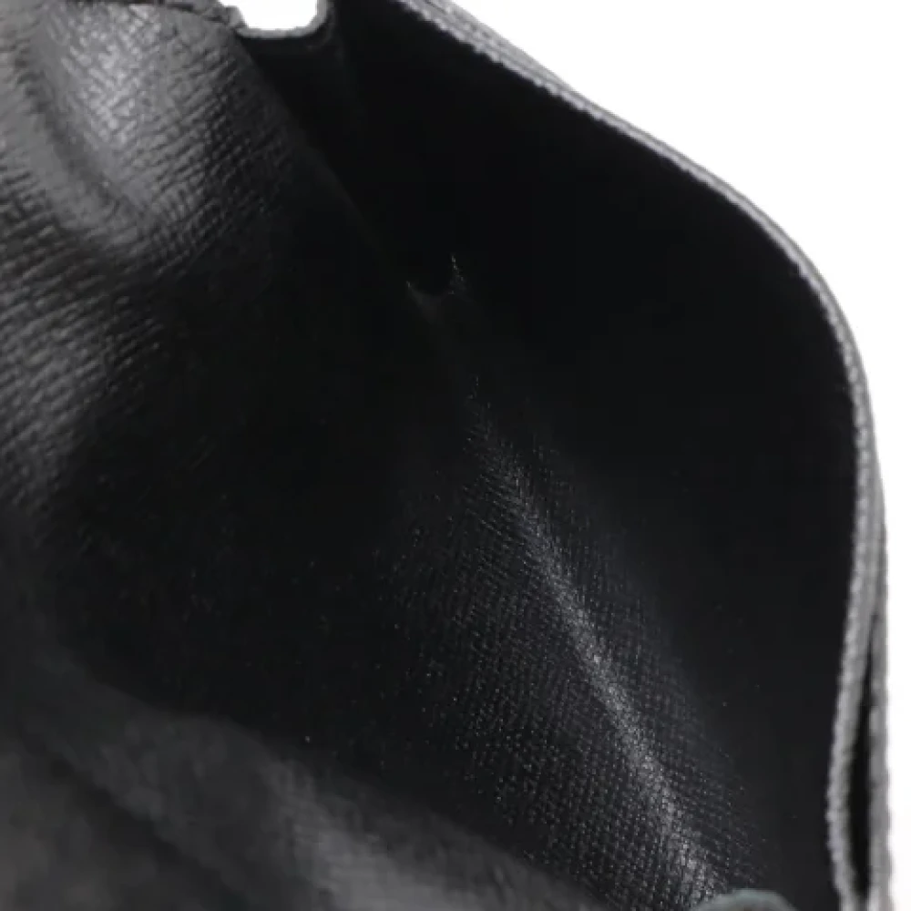 Louis Vuitton Vintage Pre-owned Leather wallets Black Heren
