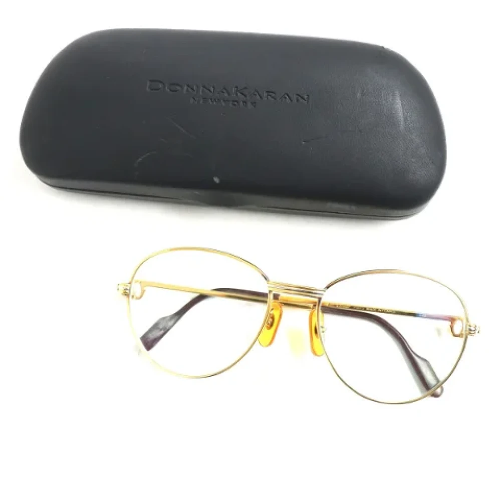 Cartier Vintage Pre-owned Metal sunglasses Yellow Dames
