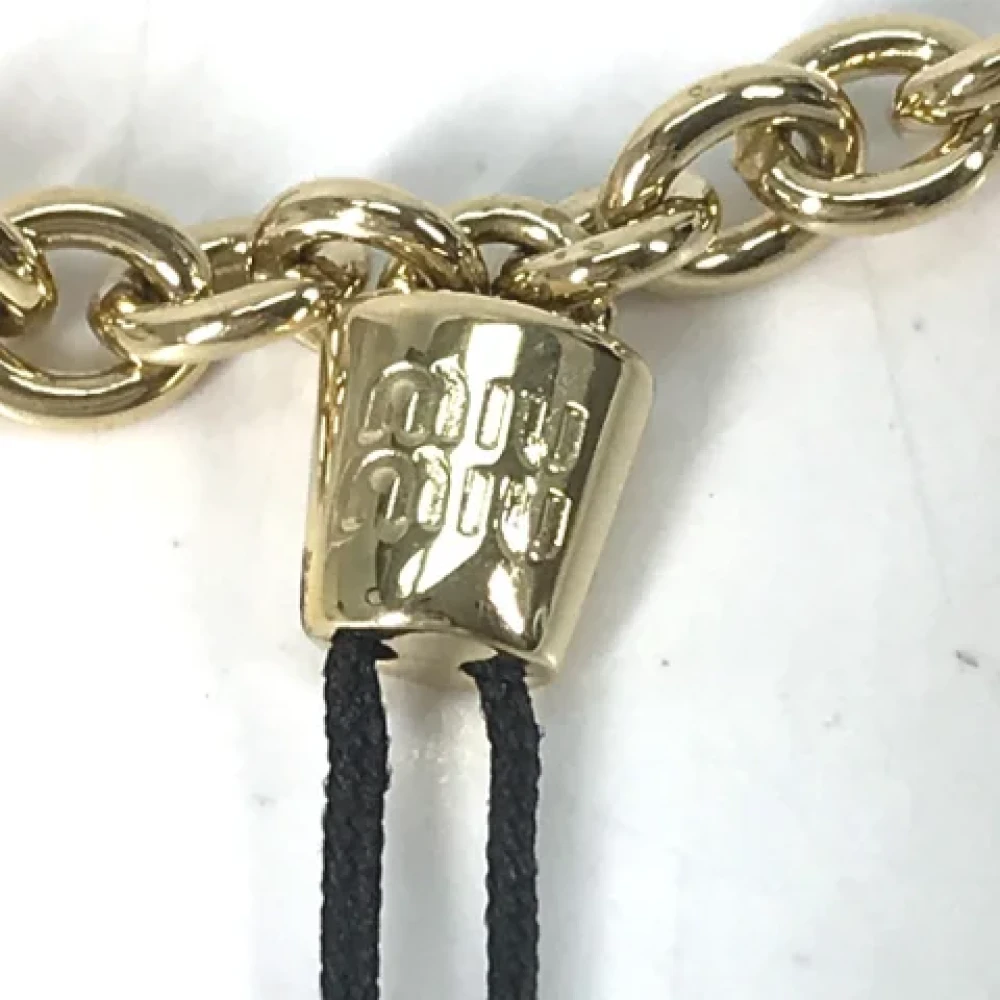 Miu Pre-owned Metal key-holders Yellow Dames