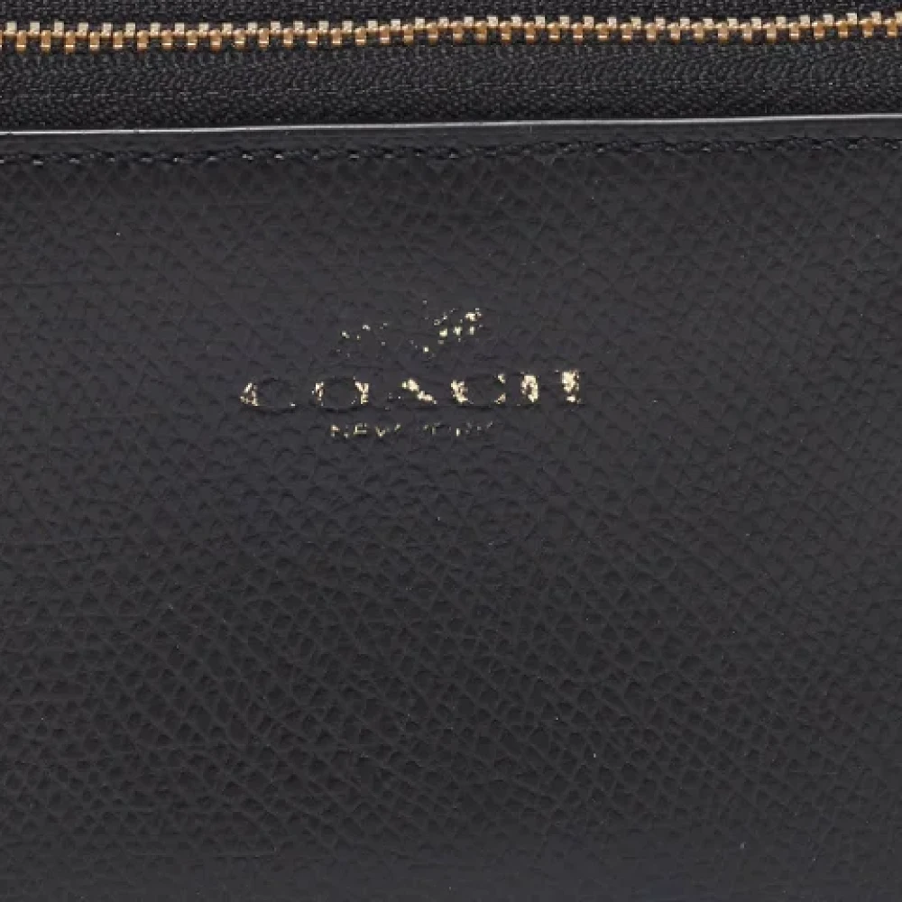 Coach Pre-owned Leather wallets Black Dames