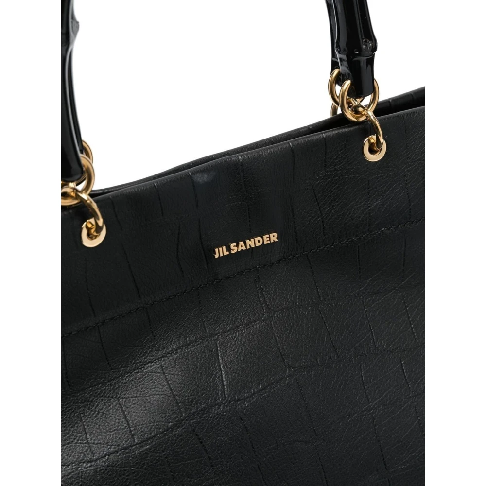 Jil Sander Zwarte krokodillenprint tote tas met gouden hardware Black Dames