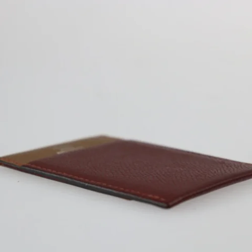 Hermès Vintage Pre-owned Leather wallets Brown Unisex