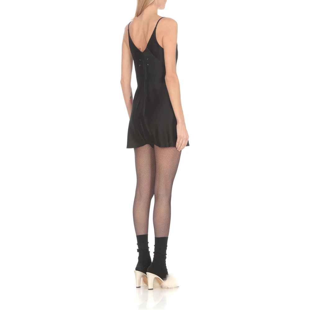 Maison Margiela Zwarte jumpsuit met wijde hals en drukknopen Black Dames