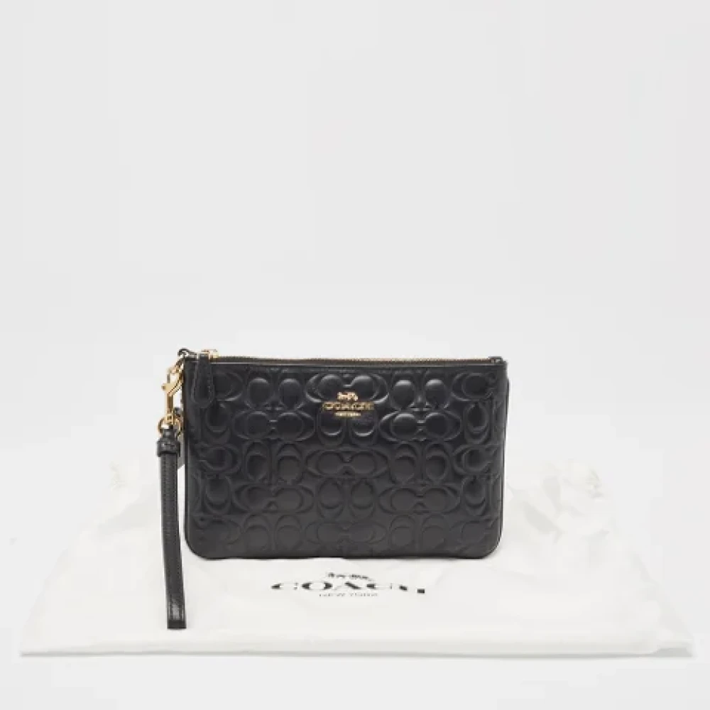 Coach Pre-owned Leather clutches Black Dames