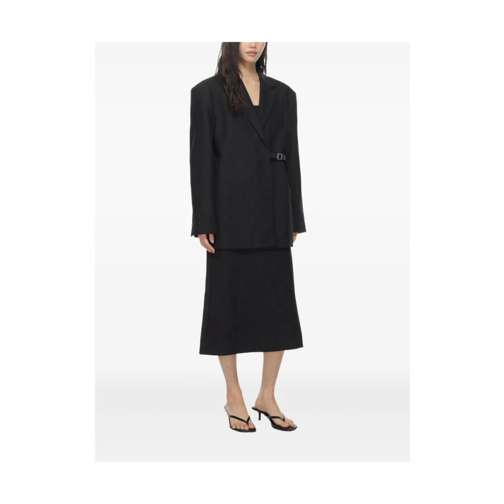 Studio Nicholson Zwarte Jas met Gesp Sluiting Black Dames