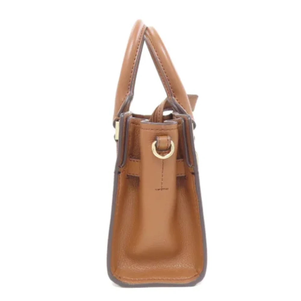 Michael Kors Pre-owned Plastic handbags Brown Dames