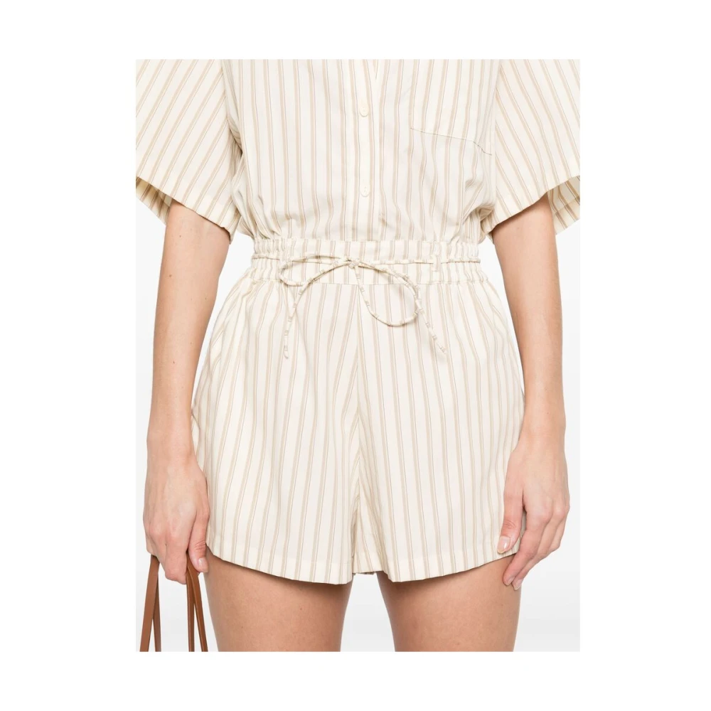 Faithfull the Brand Beige Jumpsuit met Knopen Beige Dames