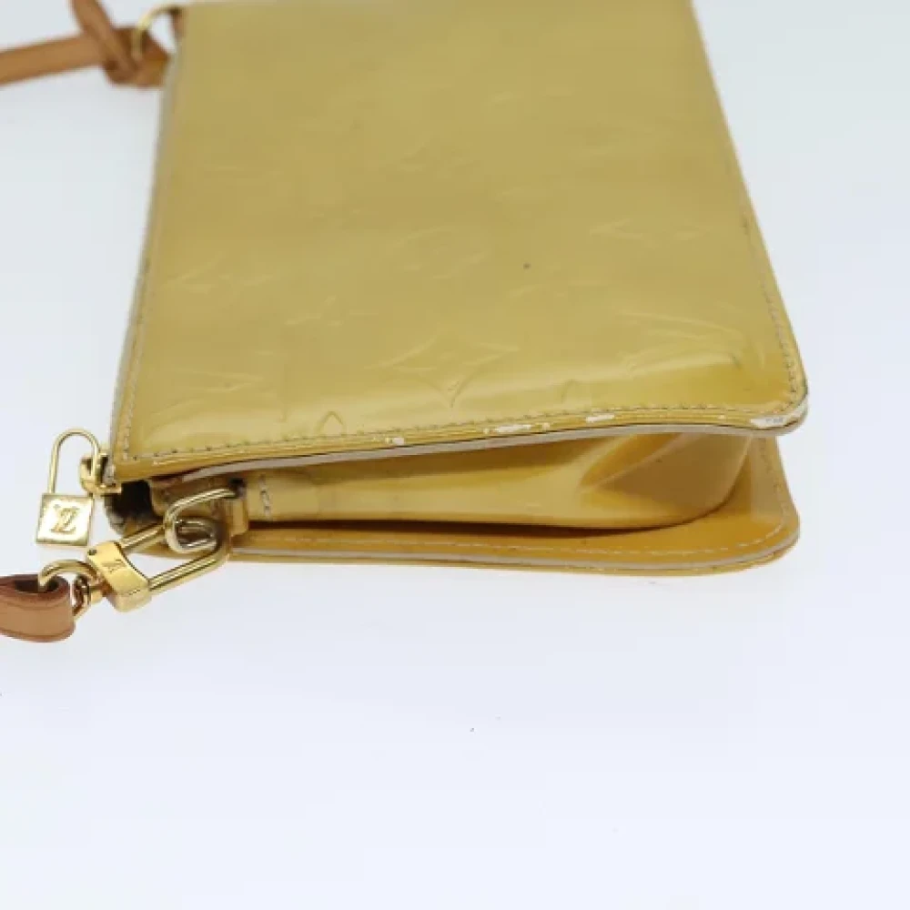Louis Vuitton Vintage Pre-owned Leather pouches Beige Dames