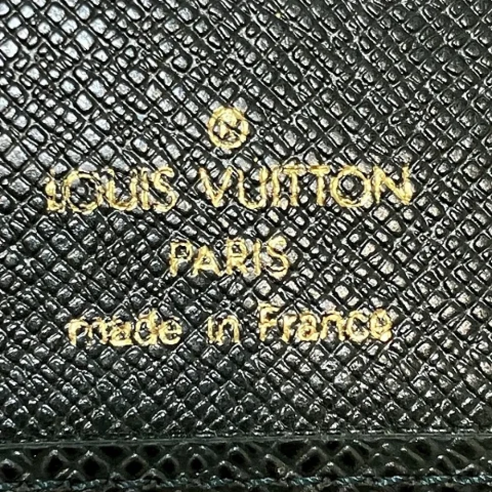 Louis Vuitton Vintage Pre-owned Leather wallets Green Heren