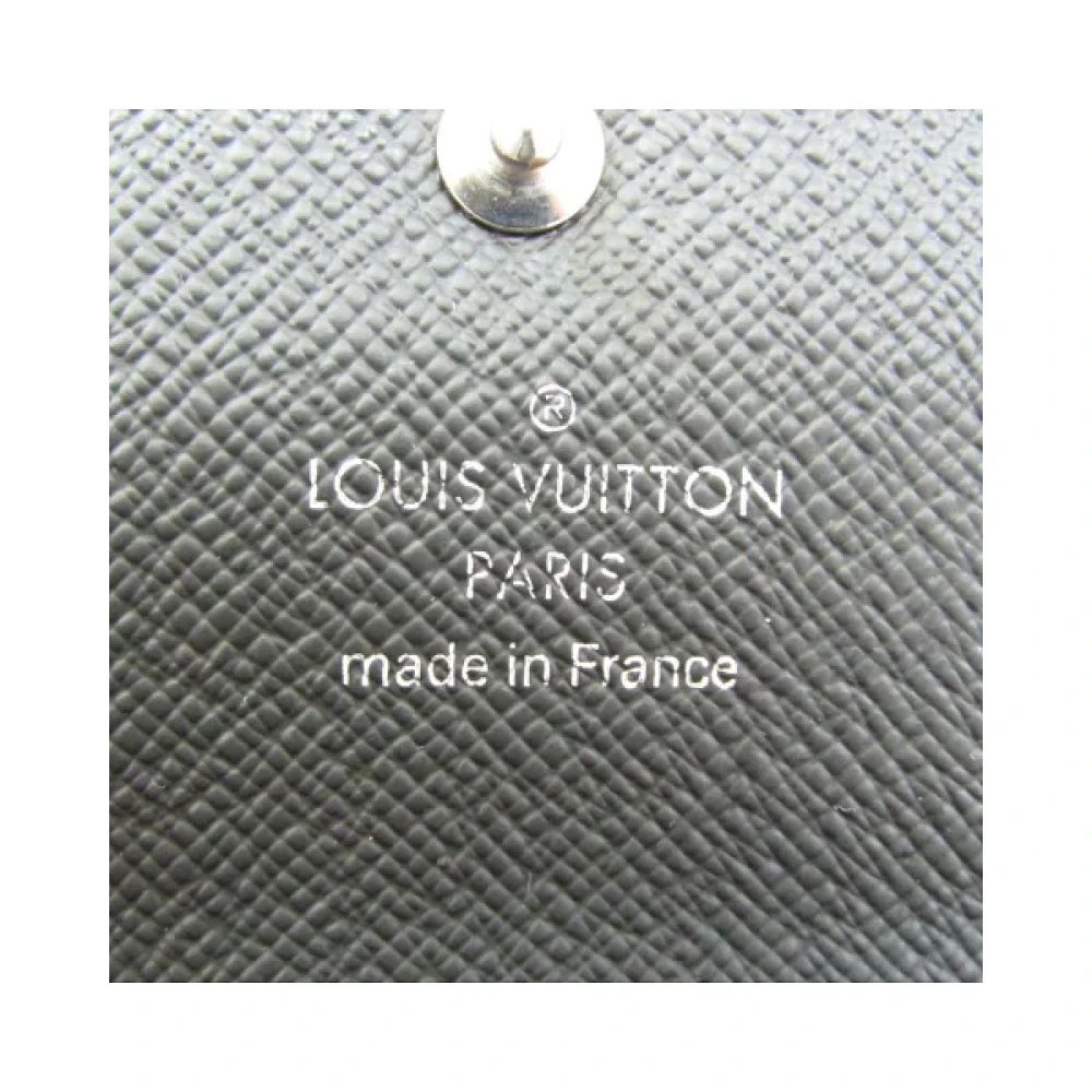 Louis Vuitton Vintage Pre-owned Canvas wallets Gray Dames