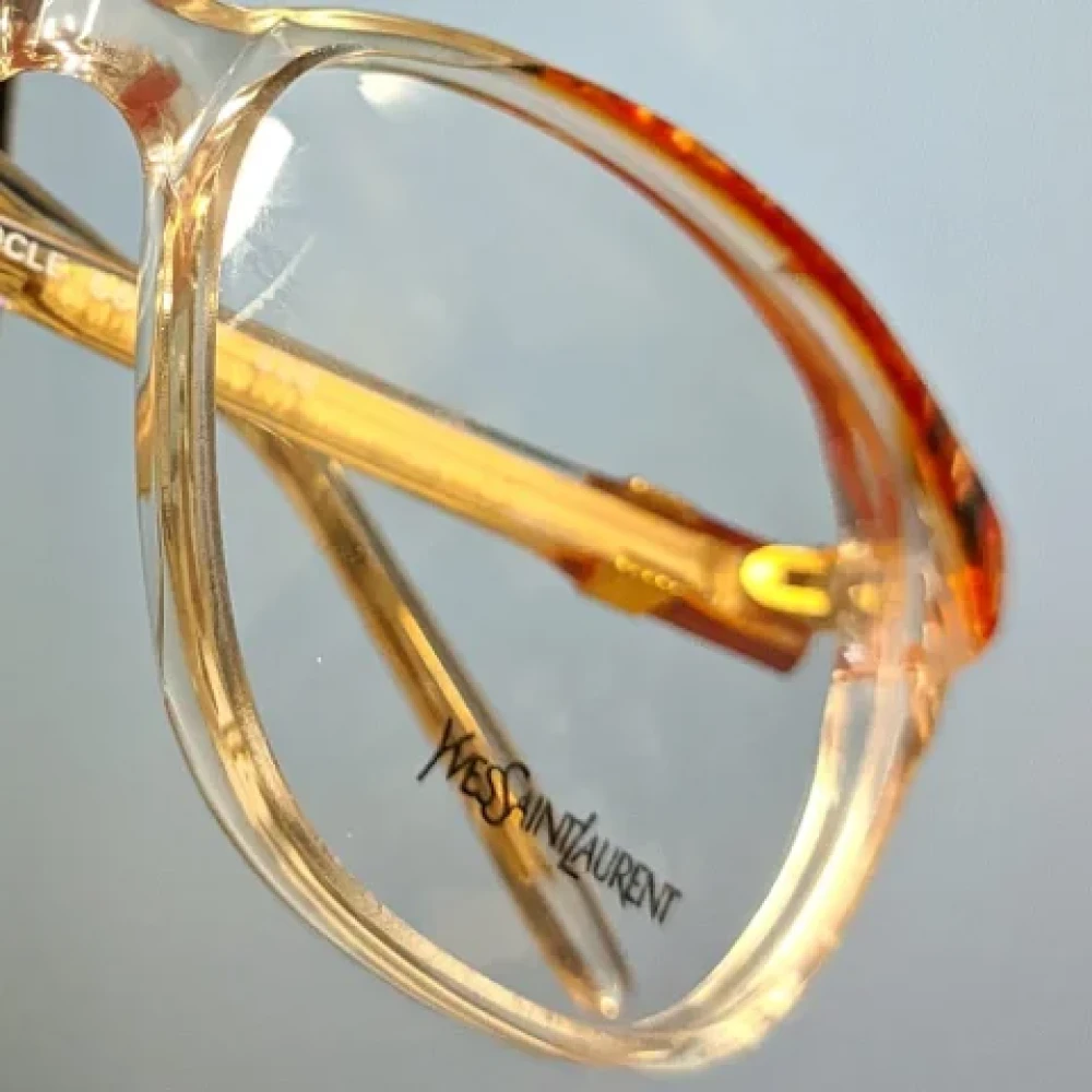 Yves Saint Laurent Vintage Pre-owned Acetate sunglasses Orange Dames