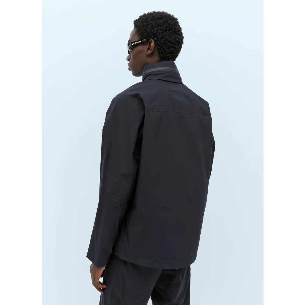 66 North Paclite Shell Jas met Capuchon Black Heren