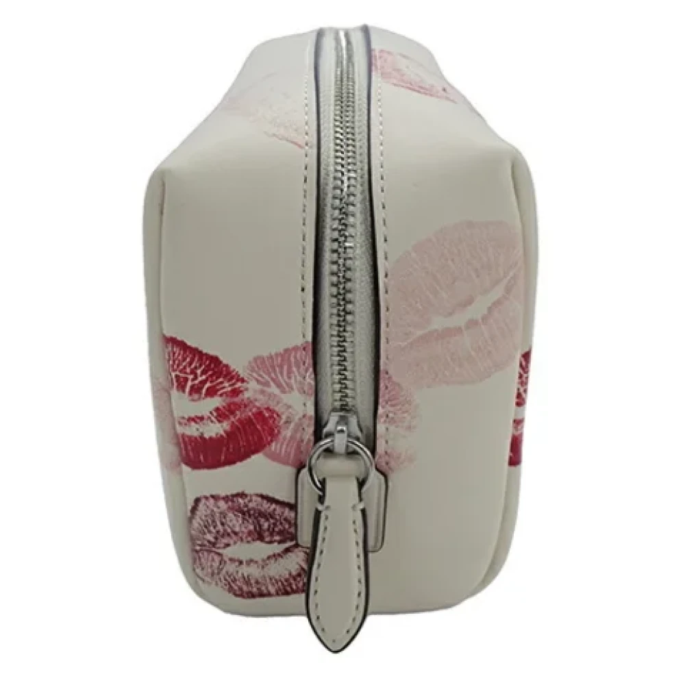 Coach Pre-owned Leather clutches Beige Dames