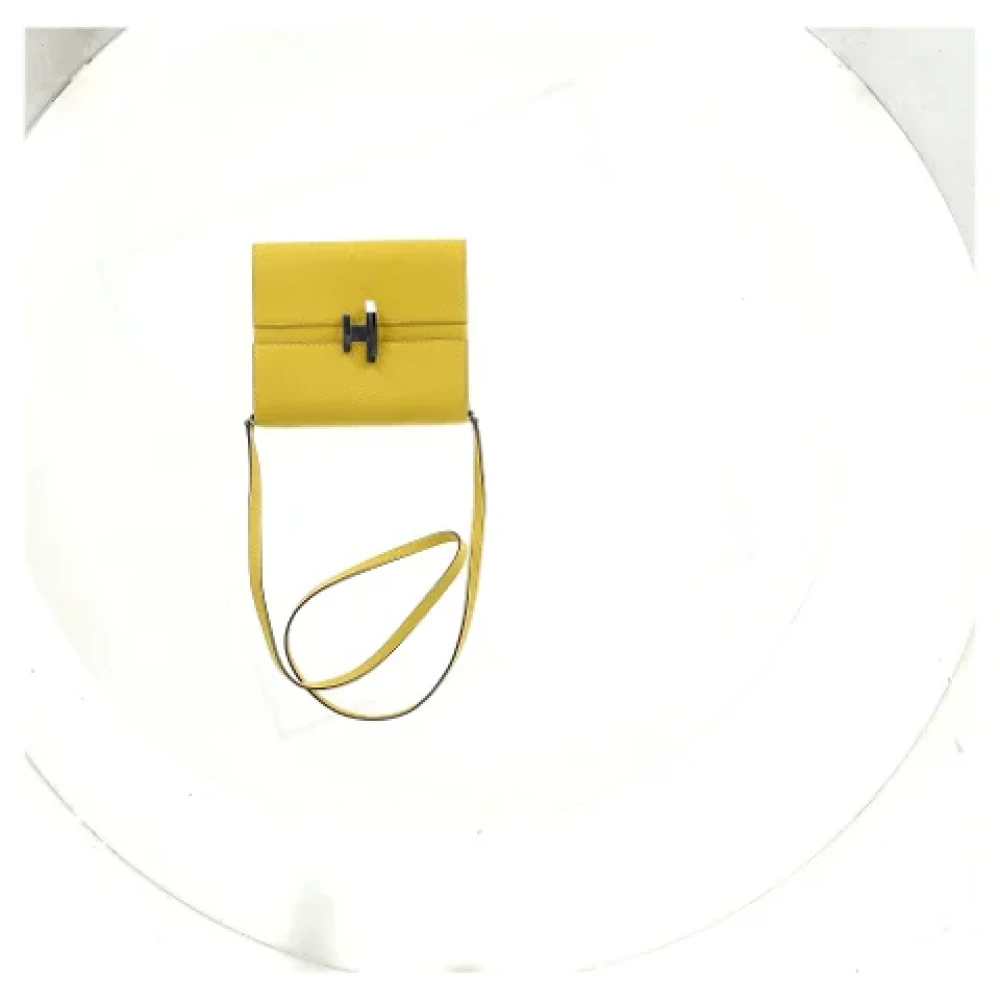 Hermès Vintage Pre-owned Leather clutches Yellow Dames