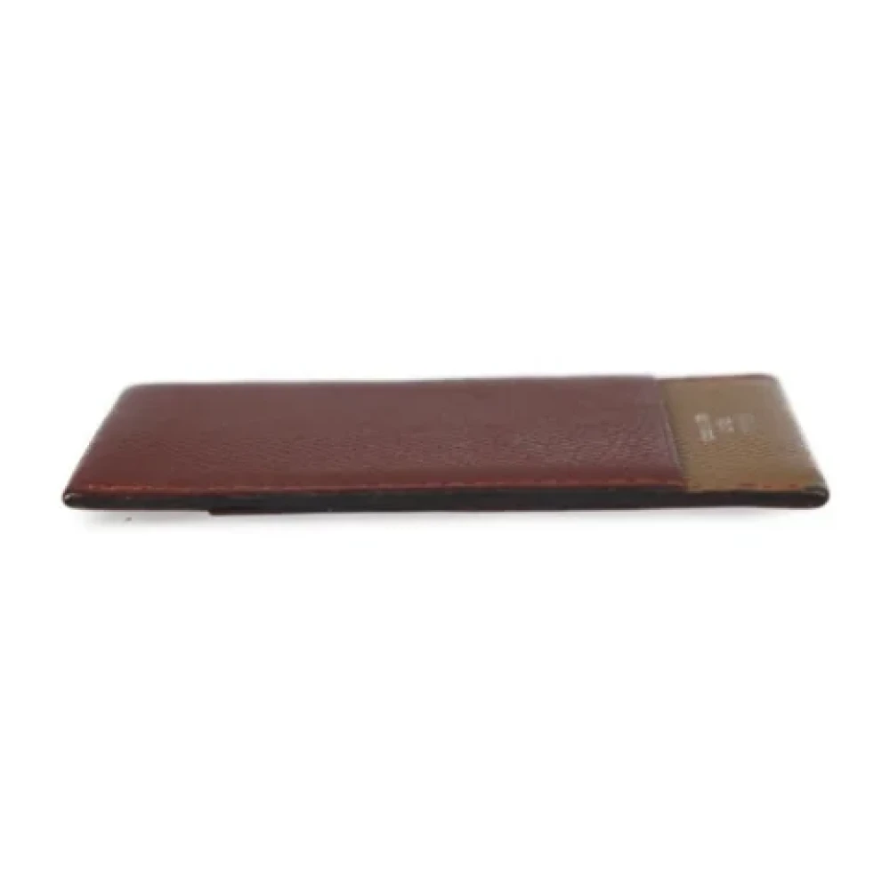 Hermès Vintage Pre-owned Leather wallets Brown Unisex