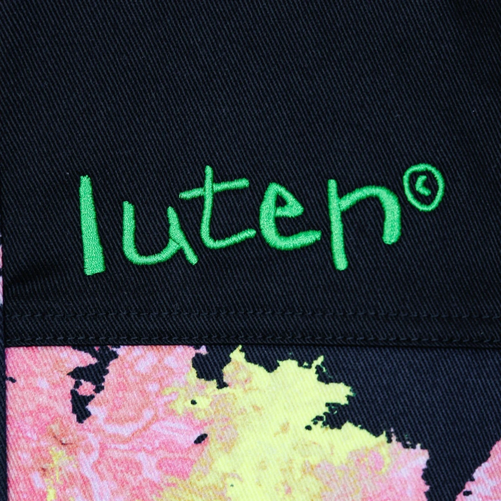Iuter Zwarte Allover Proefjas met Verstelbare Capuchon Multicolor Heren