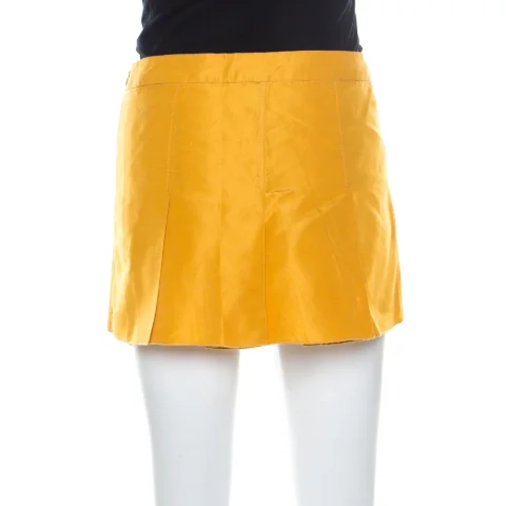 Miu Pre-owned Fabric bottoms Yellow Dames