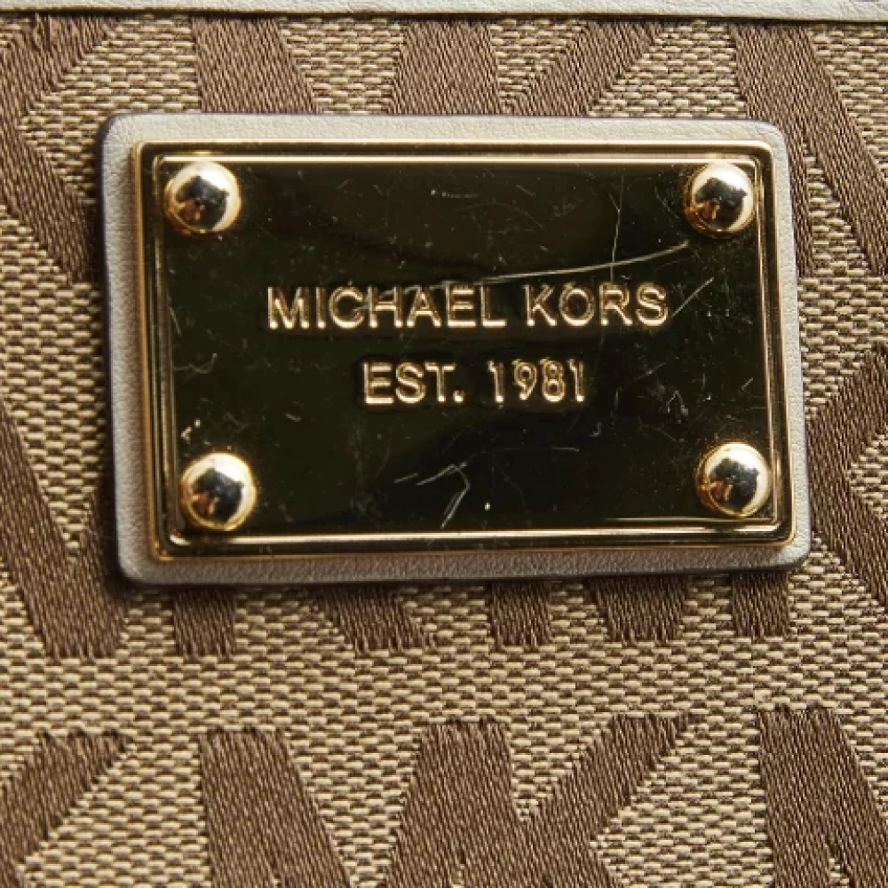 Michael Kors Pre-owned Canvas wallets Beige Dames