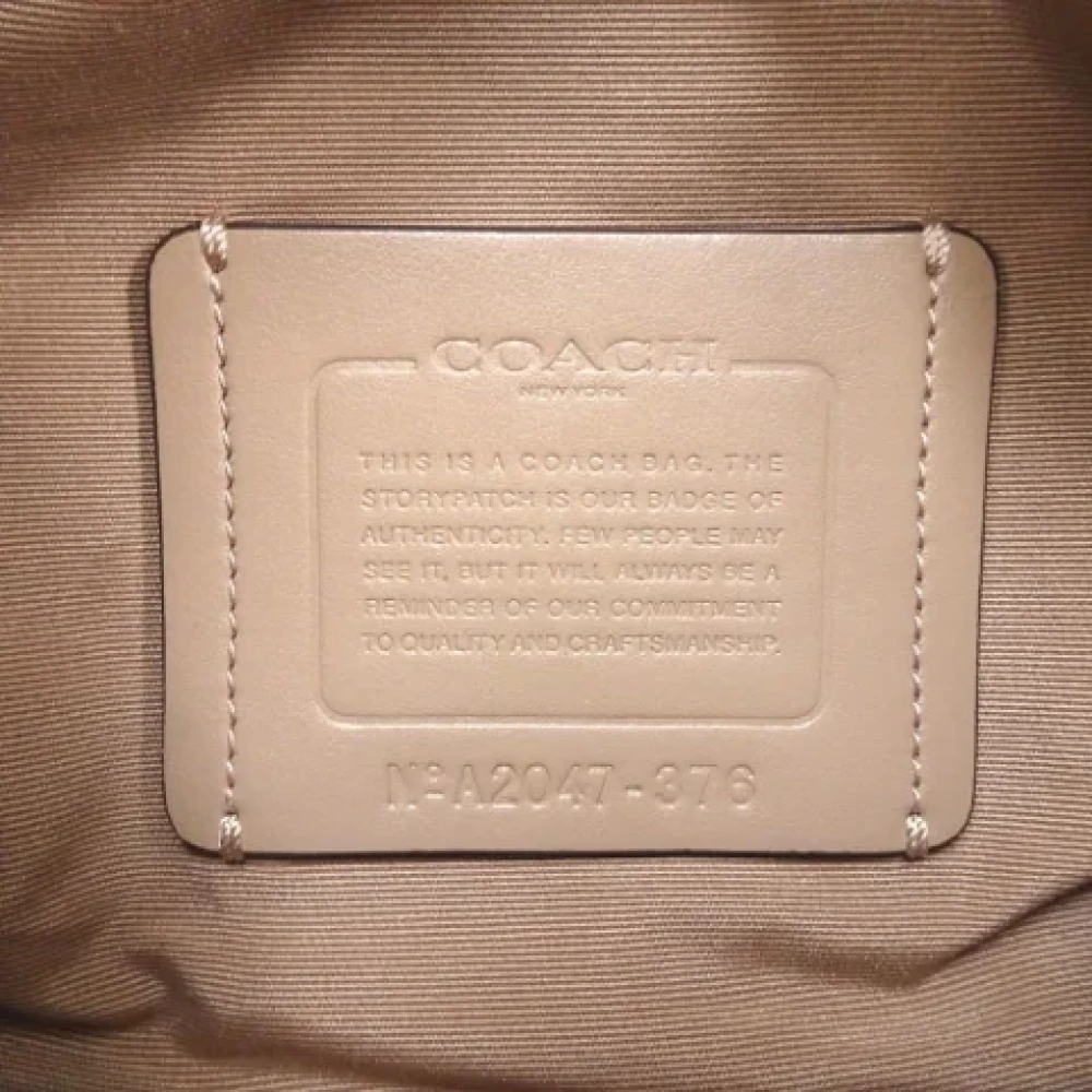 Coach Pre-owned Canvas clutches White Dames