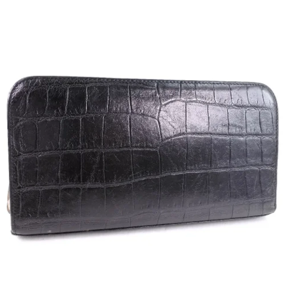 Yves Saint Laurent Vintage Pre-owned Leather wallets Black Heren