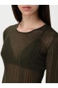 pull-tricote-cotele-transparent-a-manches-longues