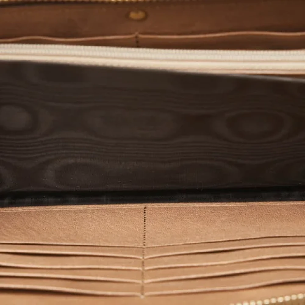Yves Saint Laurent Vintage Pre-owned Leather wallets Brown Dames