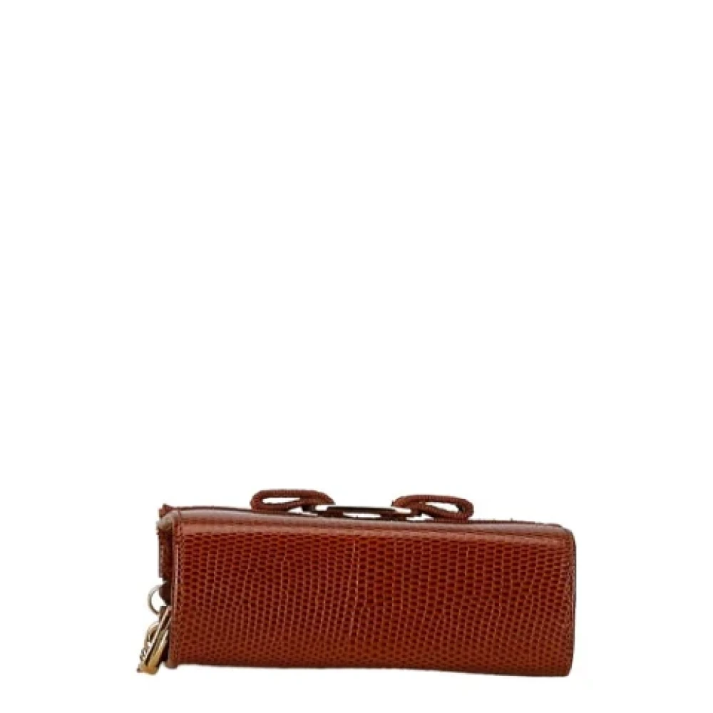 Salvatore Ferragamo Pre-owned Leather clutches Brown Dames