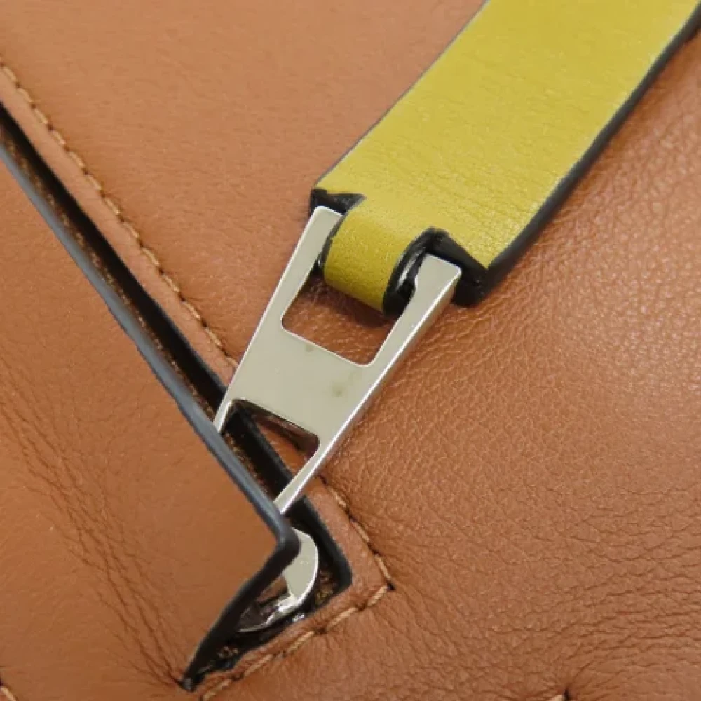 Loewe Pre-owned Leather pouches Brown Dames