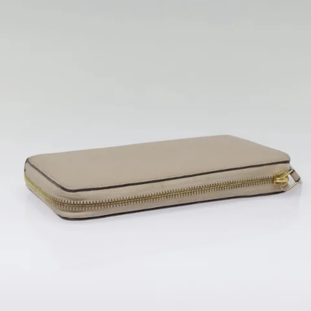 Louis Vuitton Vintage Pre-owned Leather wallets Beige Dames