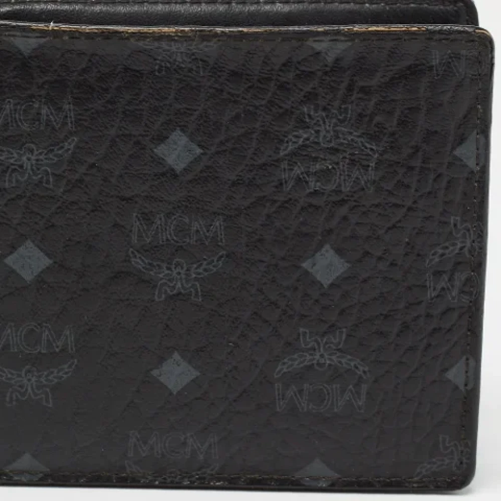 MCM Pre-owned Coated canvas wallets Black Dames