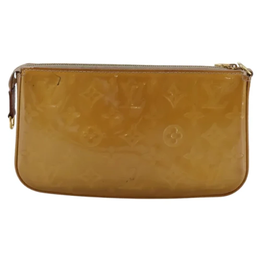 Louis Vuitton Vintage Pre-owned Leather pouches Beige Dames
