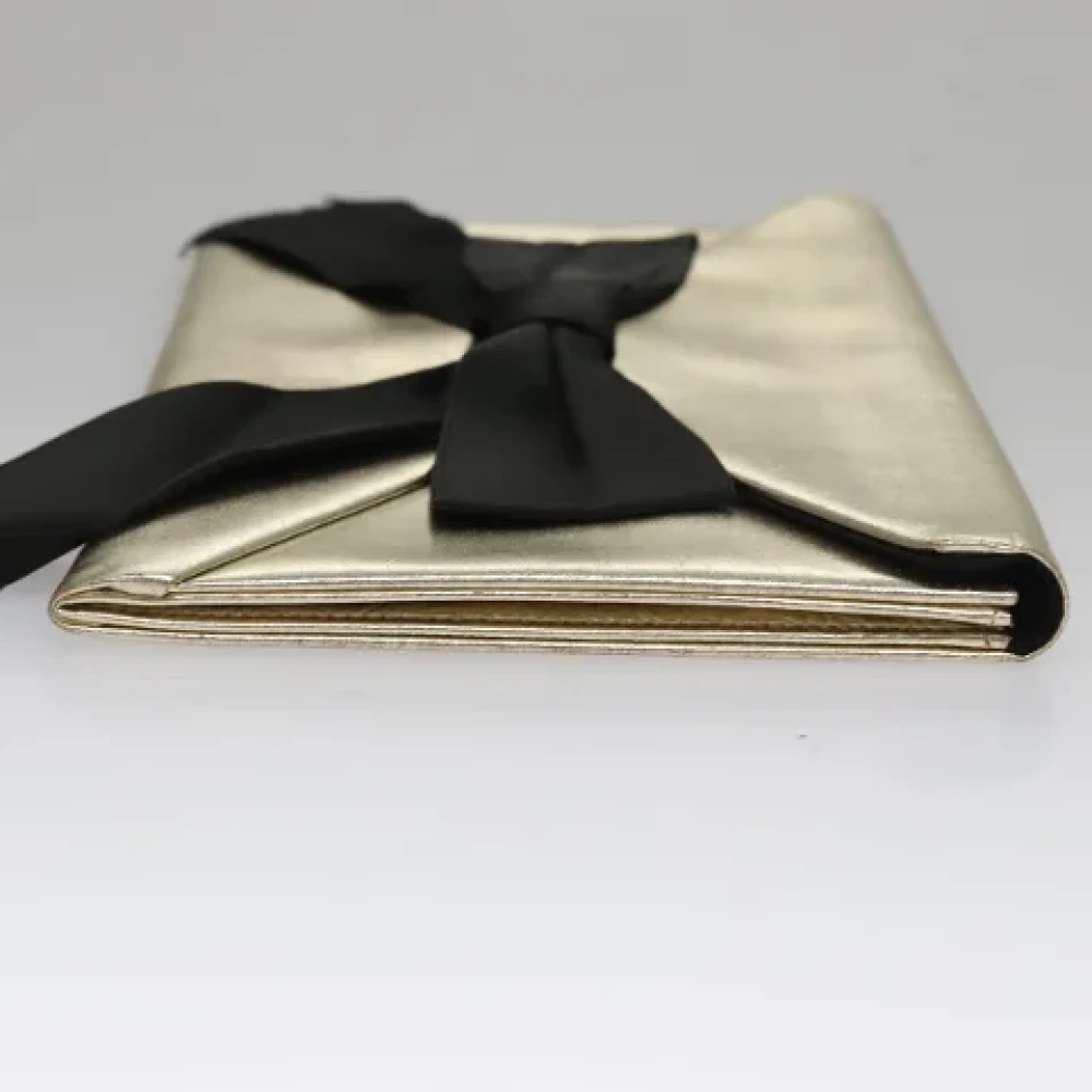 Saint Laurent Vintage Pre-owned Leather clutches Yellow Dames