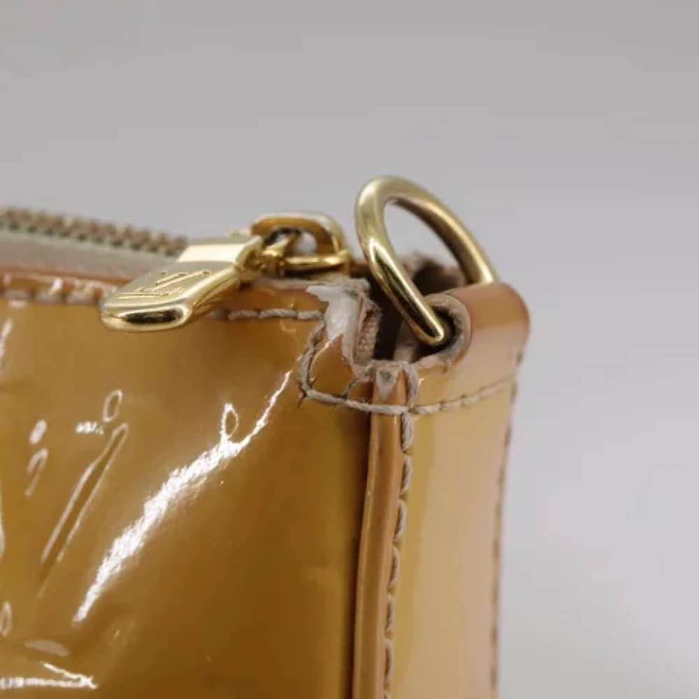 Louis Vuitton Vintage Pre-owned Leather pouches Beige Dames