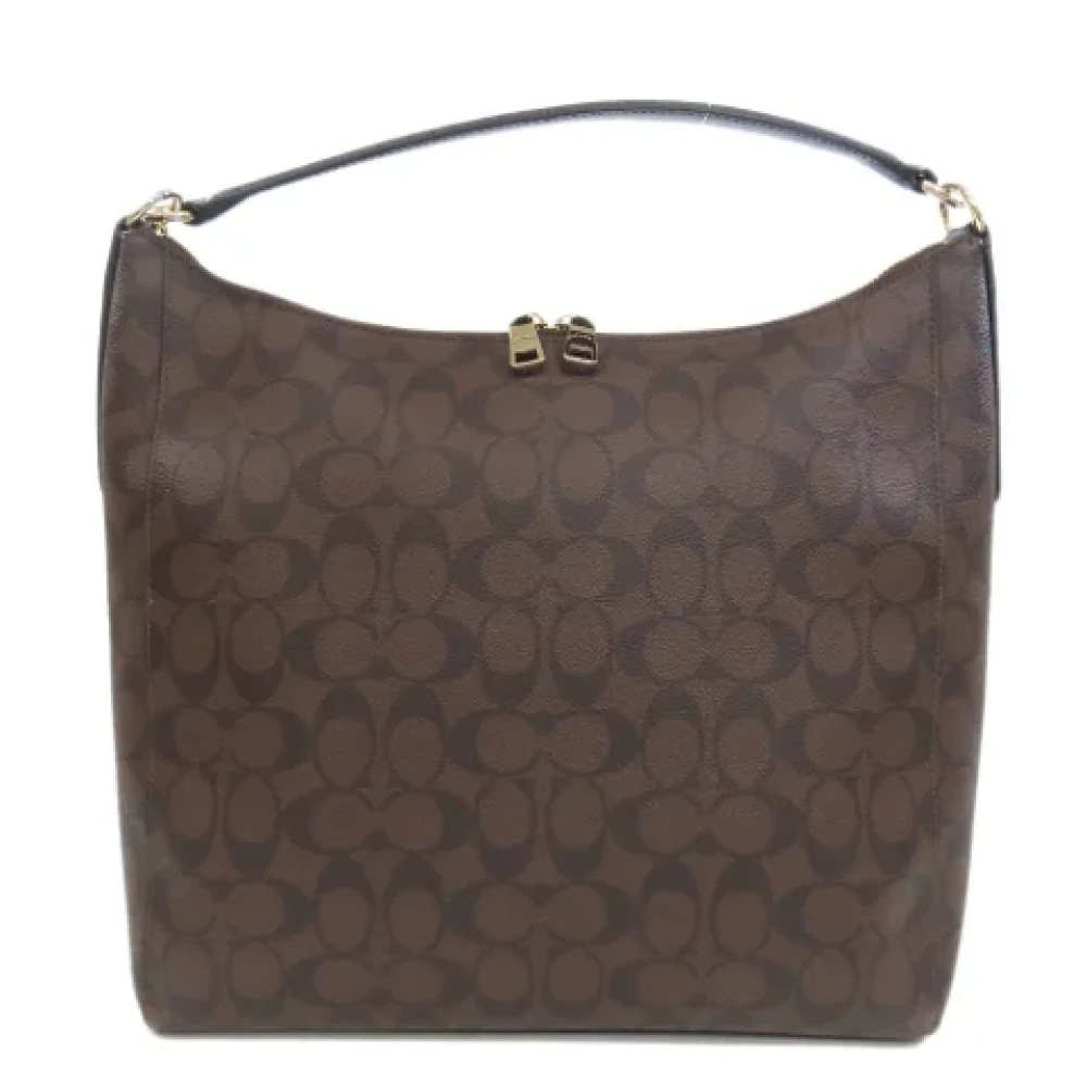 Coach Pre-owned Plastic handbags Brown Dames