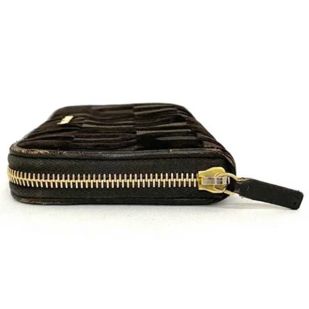 Miu Pre-owned Leather wallets Brown Dames