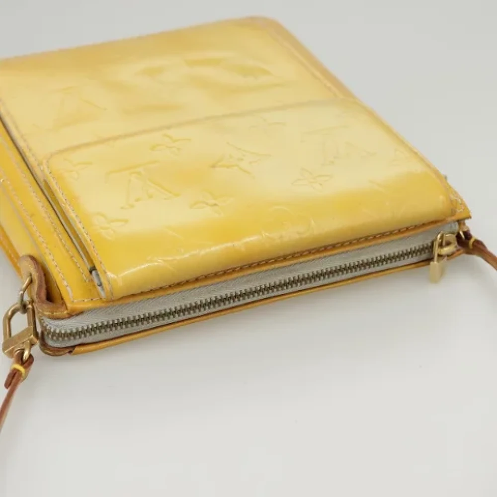 Louis Vuitton Vintage Pre-owned Leather pouches Yellow Dames