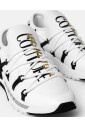 white-sneakers-with-gold-logo-print