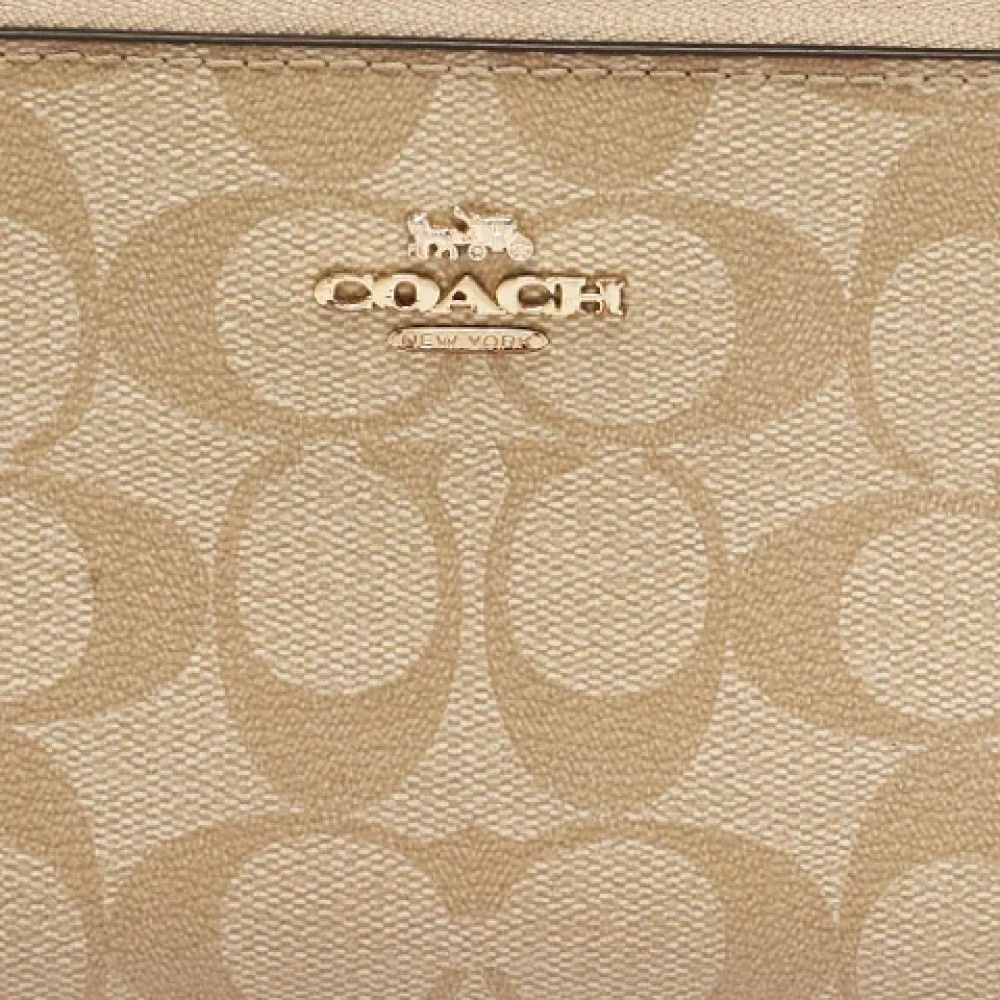 Coach Pre-owned Coated canvas wallets Beige Dames