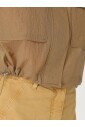 gilet-utilitaire-avec-details-de-perles