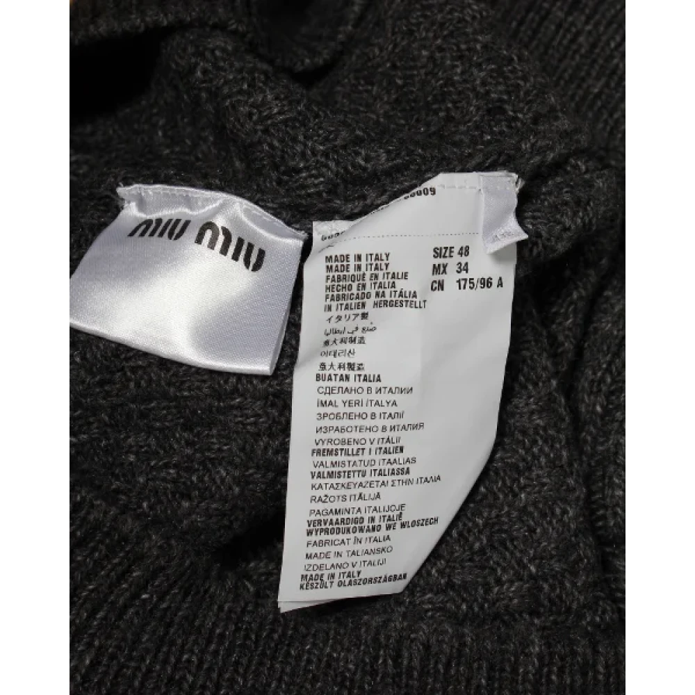 Miu Pre-owned Plastic outerwear Gray Dames