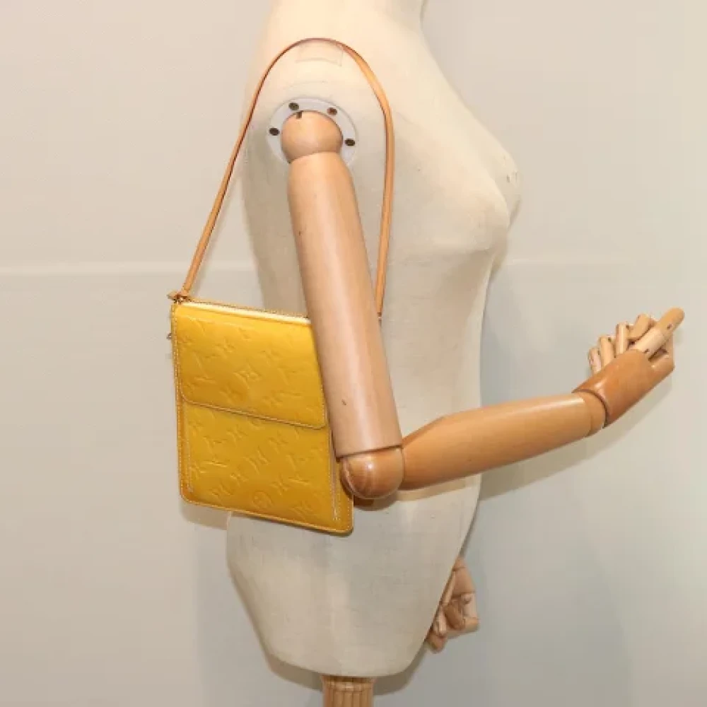 Louis Vuitton Vintage Pre-owned Leather clutches Yellow Dames
