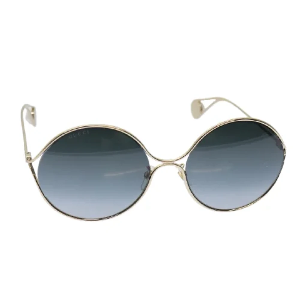 Gucci Vintage Pre-owned Metal sunglasses Yellow Dames