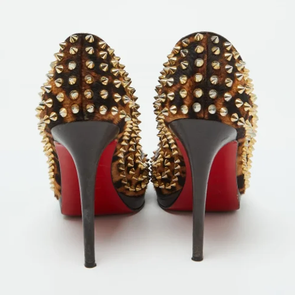 Christian Louboutin Pre-owned Fabric heels Brown Dames