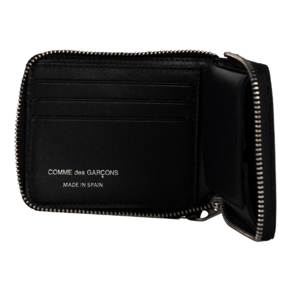 Comme des Garçons Zwarte leren portemonnee met zilveren oogje Black Unisex