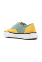 green-canvas-sneakers-with-contrast-detail